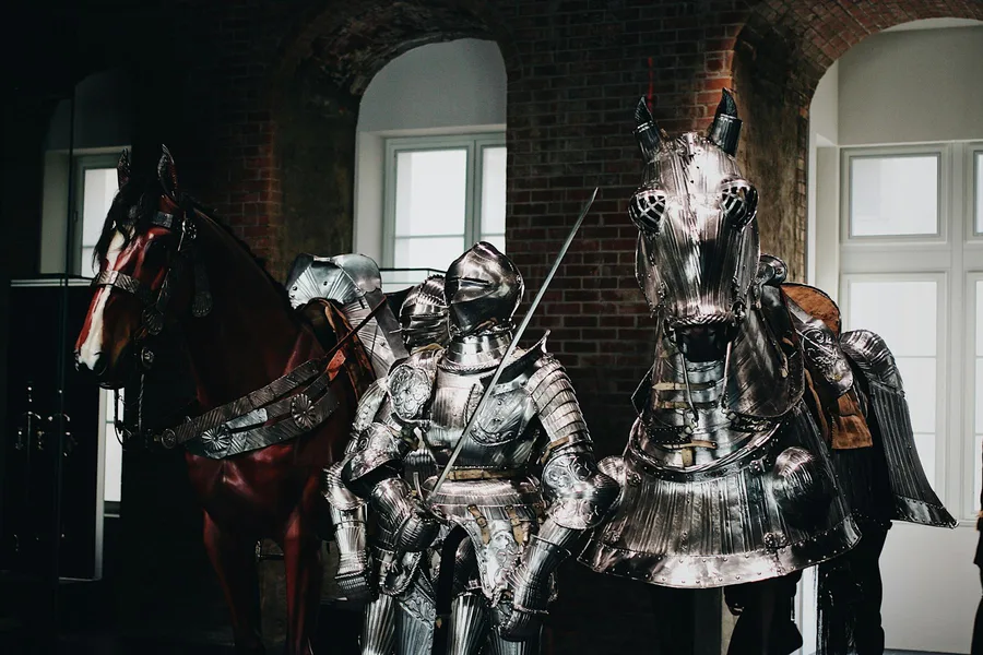 Medieval armour and sword detail — evoking the Battle of Hastings scenes in the Bayeux Tapestry