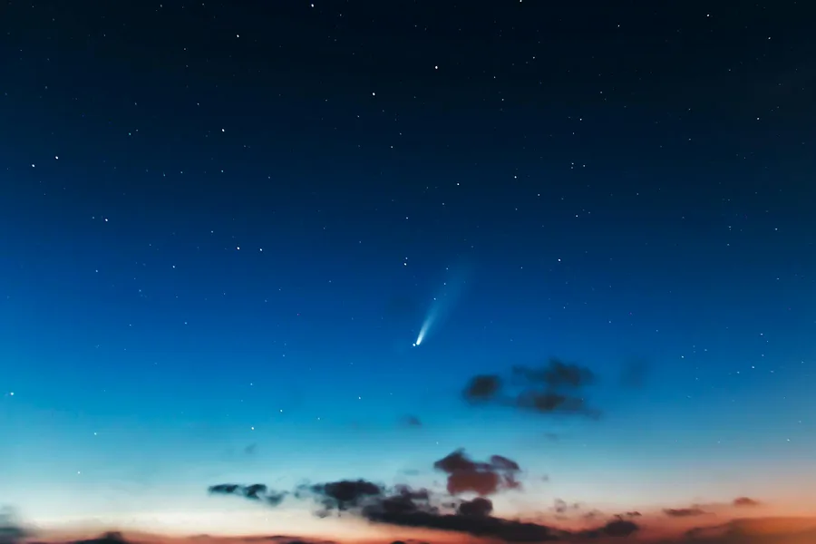 Night sky with a bright comet trail — evoking Halley's Comet as depicted in the Bayeux Tapestry