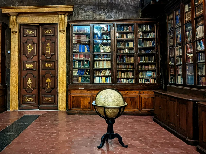 Interior of the Biblioteca Medicea Laurenziana, Florence — the reading-room context for the satellite installation of two 1958 Seagram Murals studies at the foot of Michelangelo's vestibule staircase