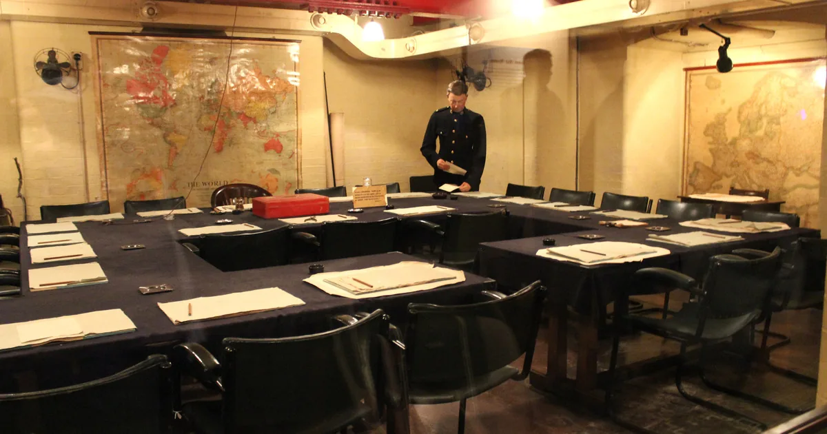 Cabinet War Room, Churchill War Rooms — U-shaped table with Churchill's high-backed chair at centre