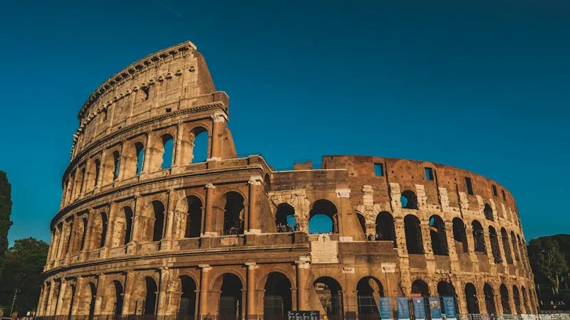 Colosseum exterior — three tiers of arches in Doric, Ionic and Corinthian orders