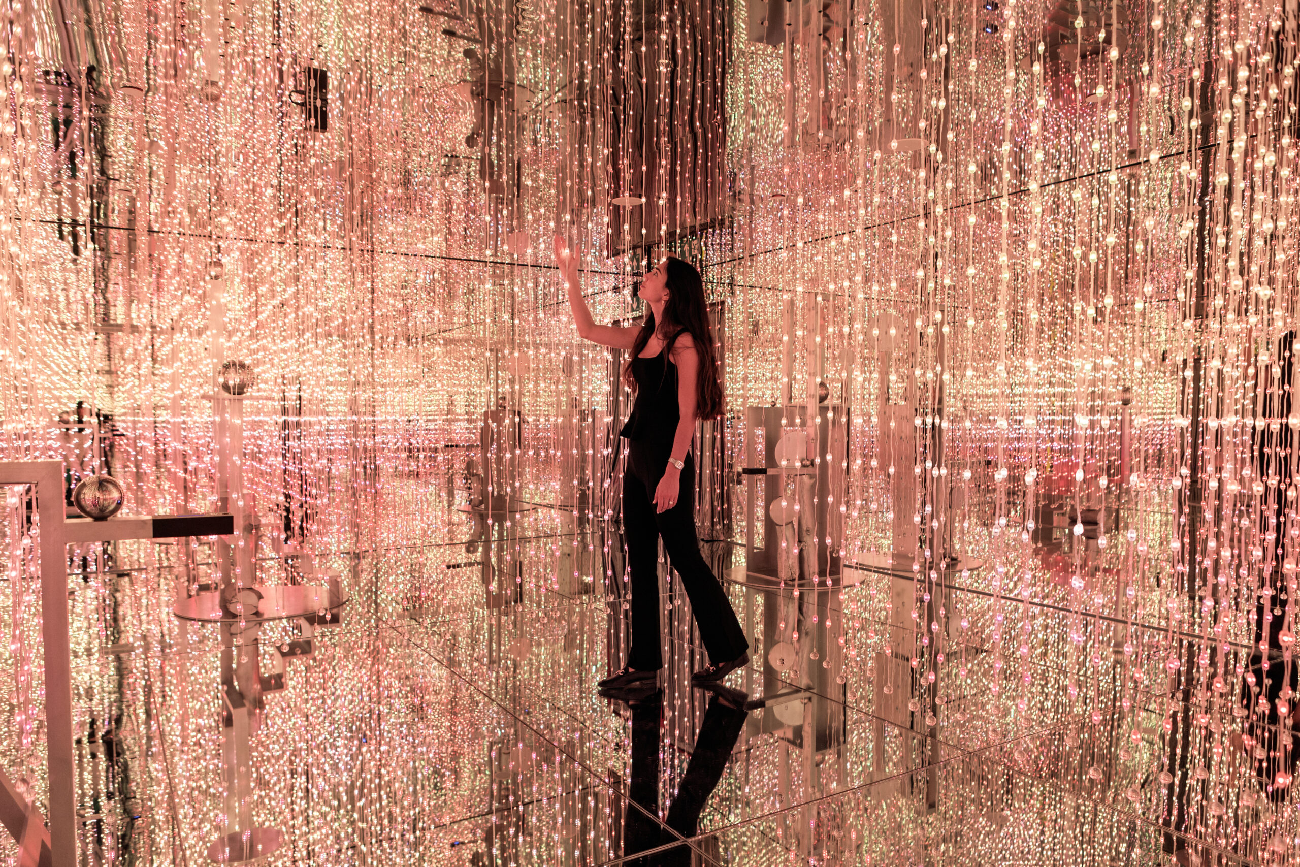 F.O.C. installation at White Rabbit Barcelona — infinity mirror room with fire-colored lights