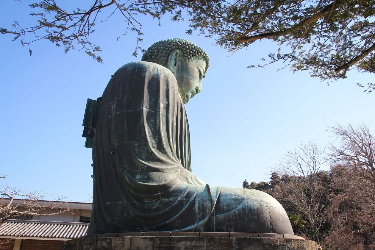 The Great Buddha of Kamakura seen from the side, open to the sky at Kotoku-in