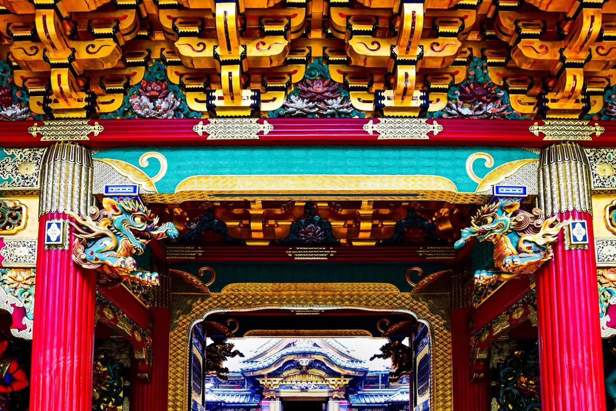 Gold leaf and carved dragons on the Yomeimon gate at Nikko Toshogu shrine